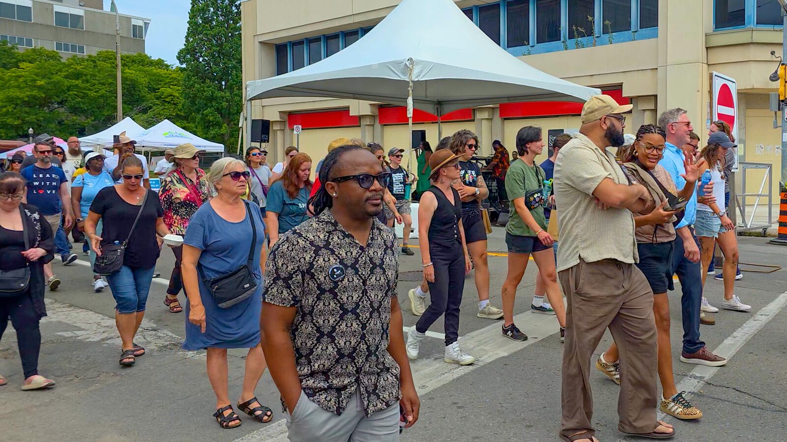 Anthony connecting with residents at a community street festival