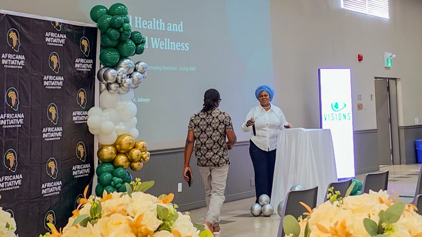 Anthony speaking at a community event on mental health and wellness